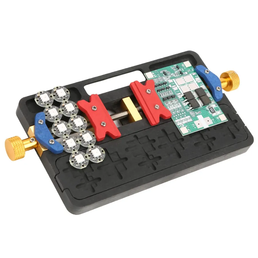 Various accessories used with soldering boards, like clips, pins and holders.