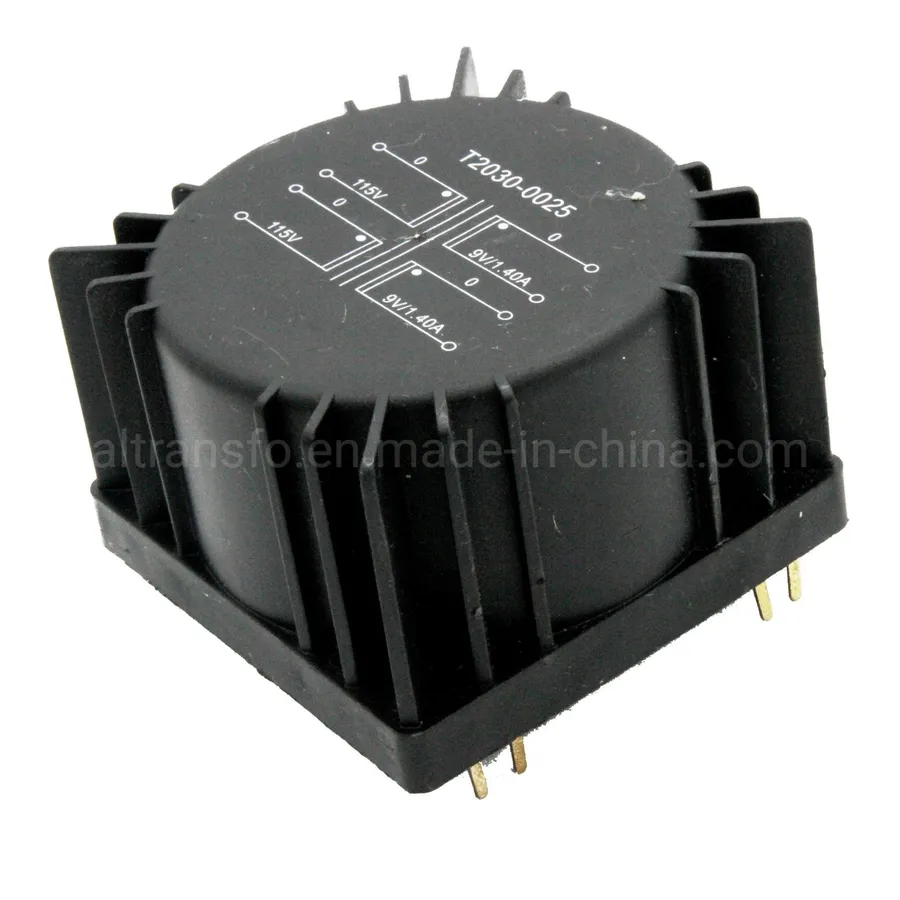 A comparison image showing both a toroidal transformer and a PCB transformer.
