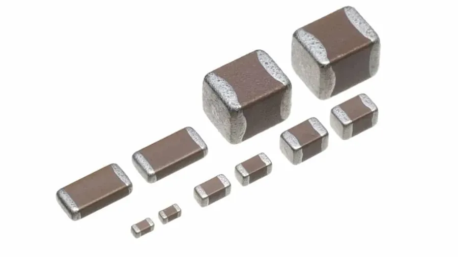 Various sizes of MLCC capacitors shown side by side.