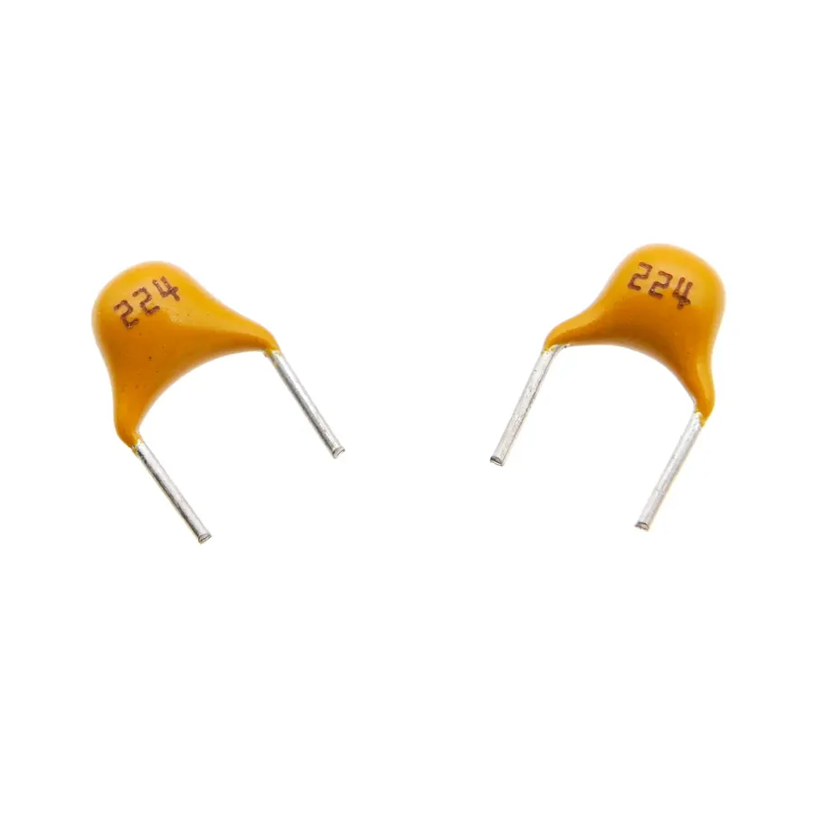 MLCC capacitors packaged on tape and reel for automated assembly.