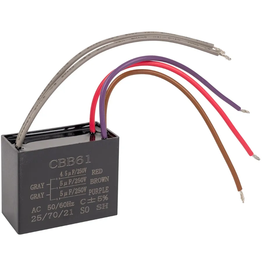 A new capacitor being compared with an old one.