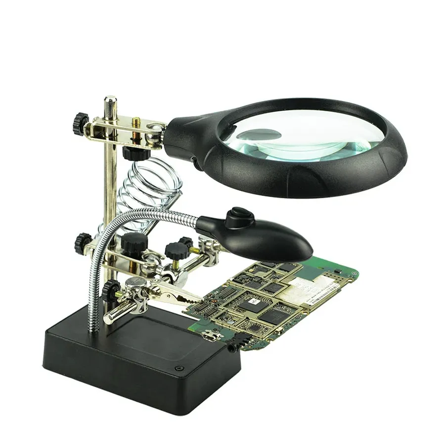 Close up of electronic component under magnifying glass.