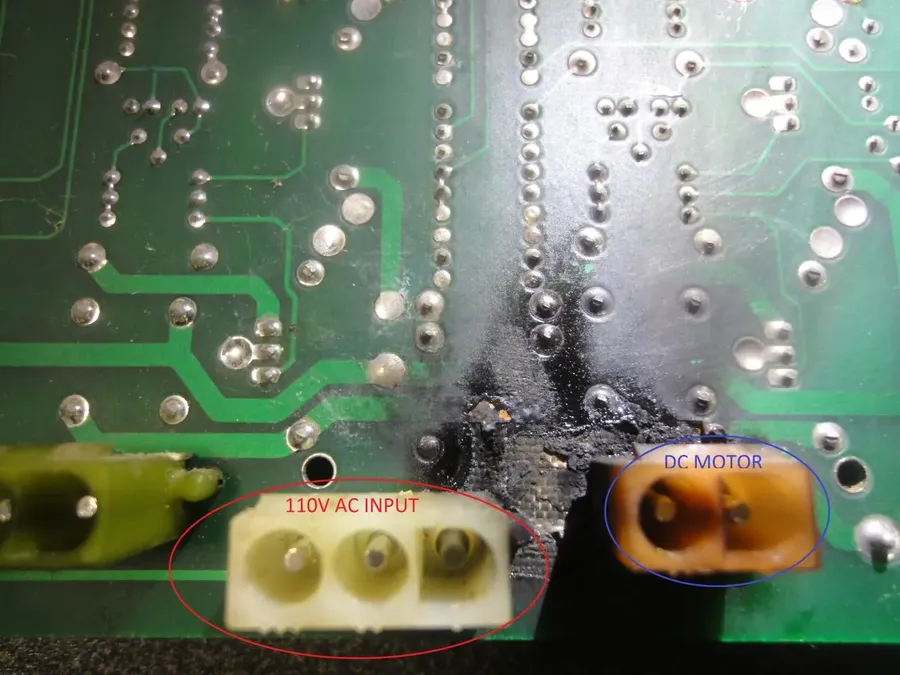 A damaged or burnt AC PCB board