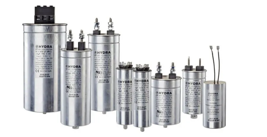 A PFC capacitor with a heatsink attached.