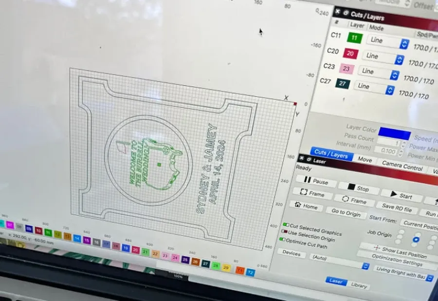 A computer screen displaying laser engraving software with PCB design.