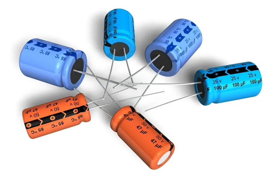 An electrolytic capacitor with its cylindrical shape.