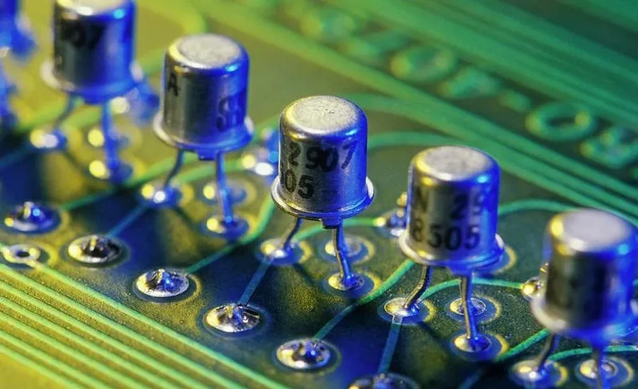 A picture of a circuit board with various transistors.