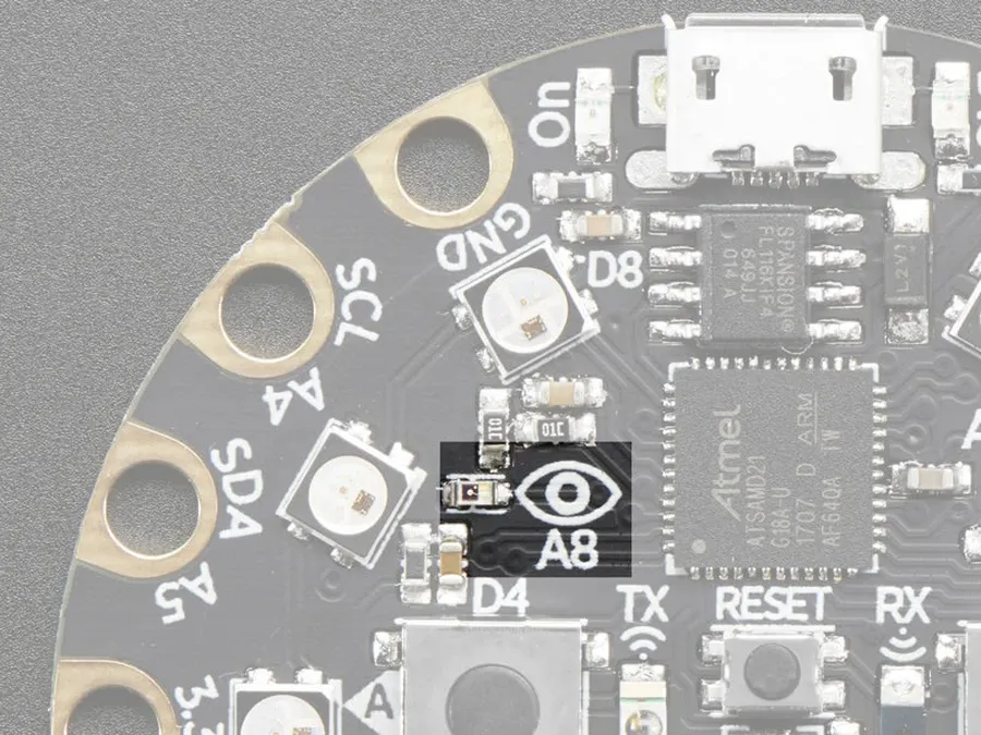 A close-up view highlighting the various sensors on the Adafruit Circuit Playground.