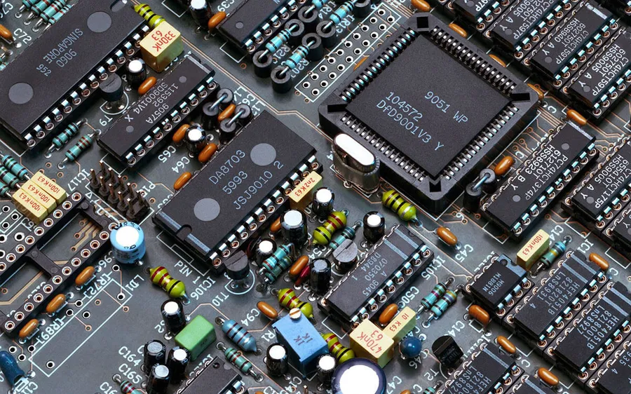Close-up of various electronic components on a PCB.
