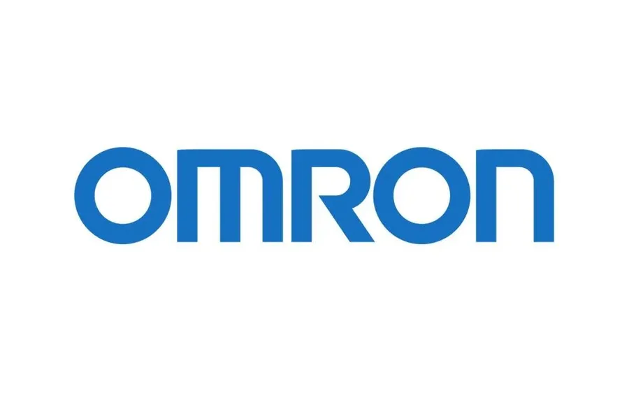An industrial scene showcasing Omron automation components in use.