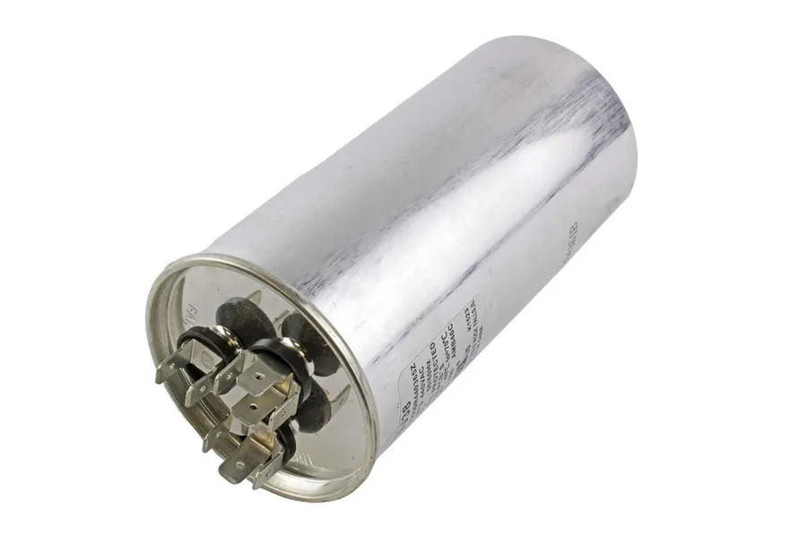 A brand new Lennox AC capacitor displayed individually.