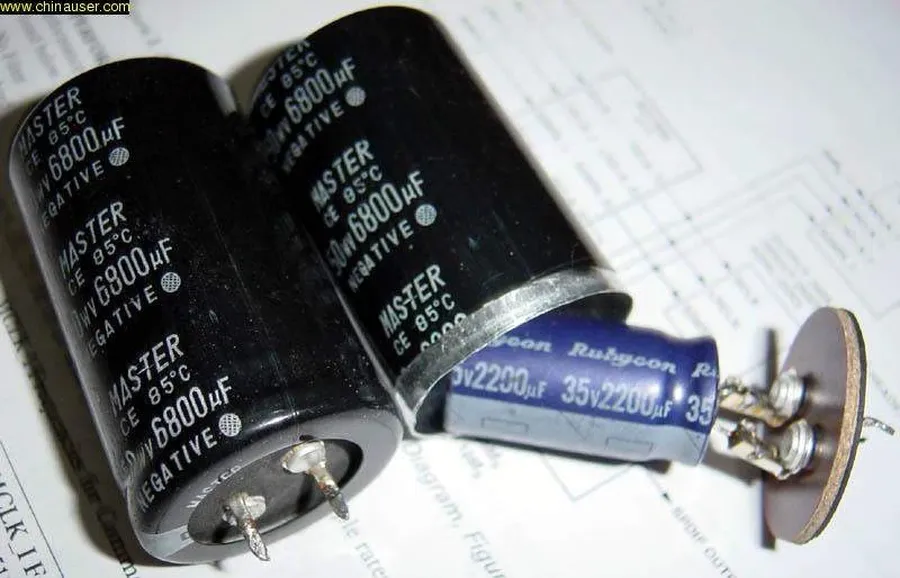 Close up of a genuine Elna capacitor with focus on security label to avoid counterfeit.