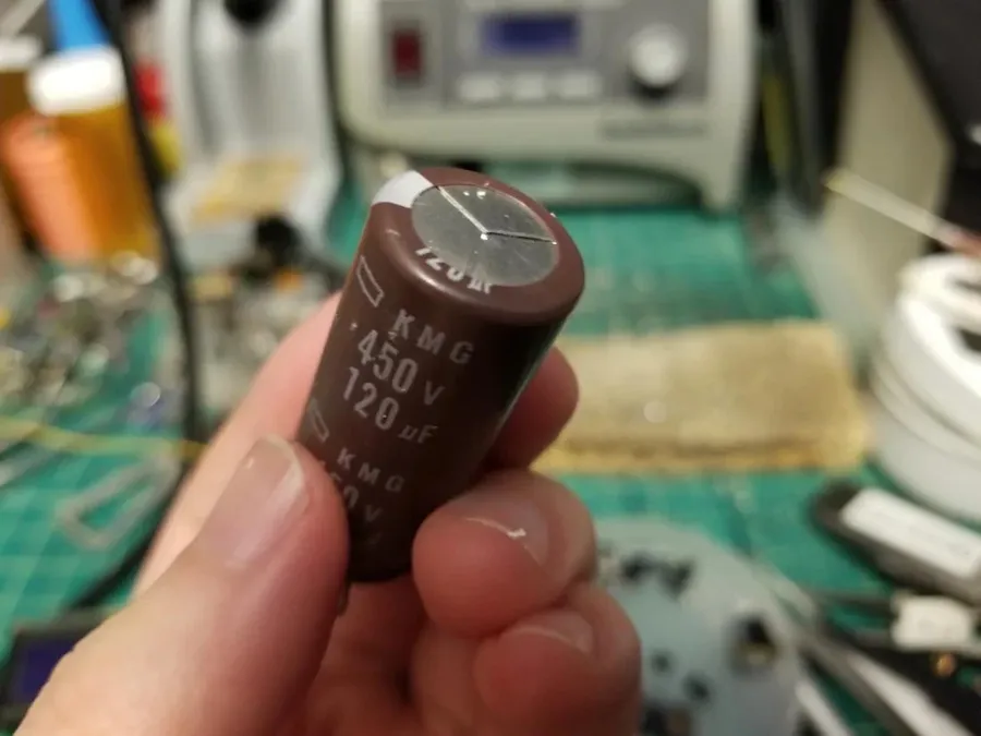 A visibly damaged or bulged capacitor.