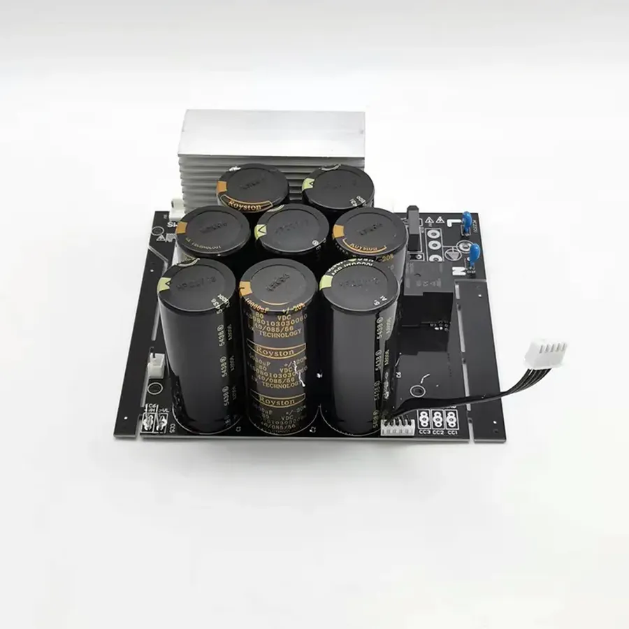 A power supply unit with several large capacitors visible.