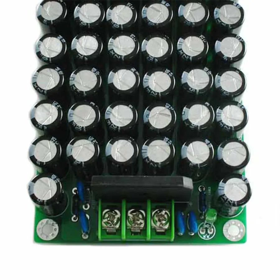 An audio circuit board with several small capacitors.