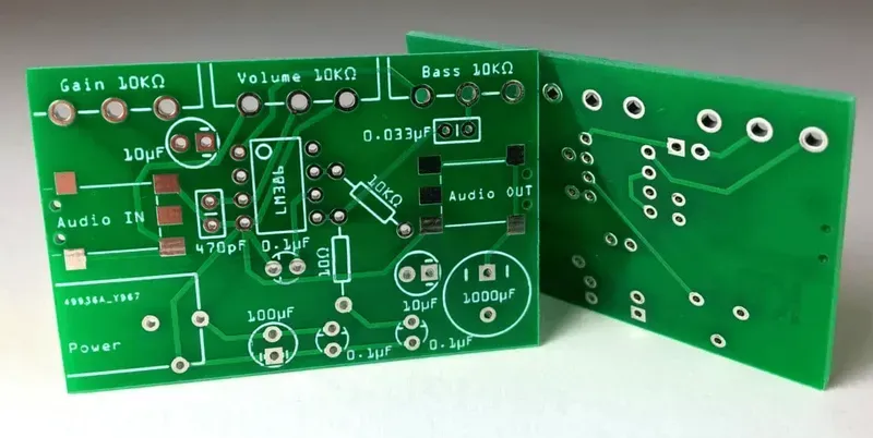 A technician inspecting a custom-shaped PCB board